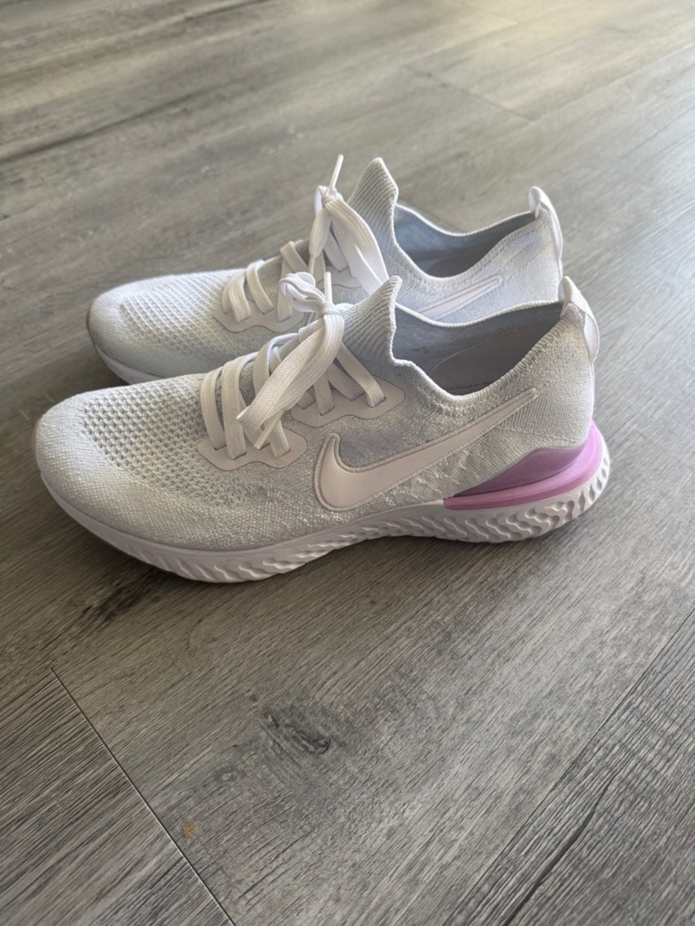 Nike Women's White Knit Running Sneakers with Pink Heel Detail